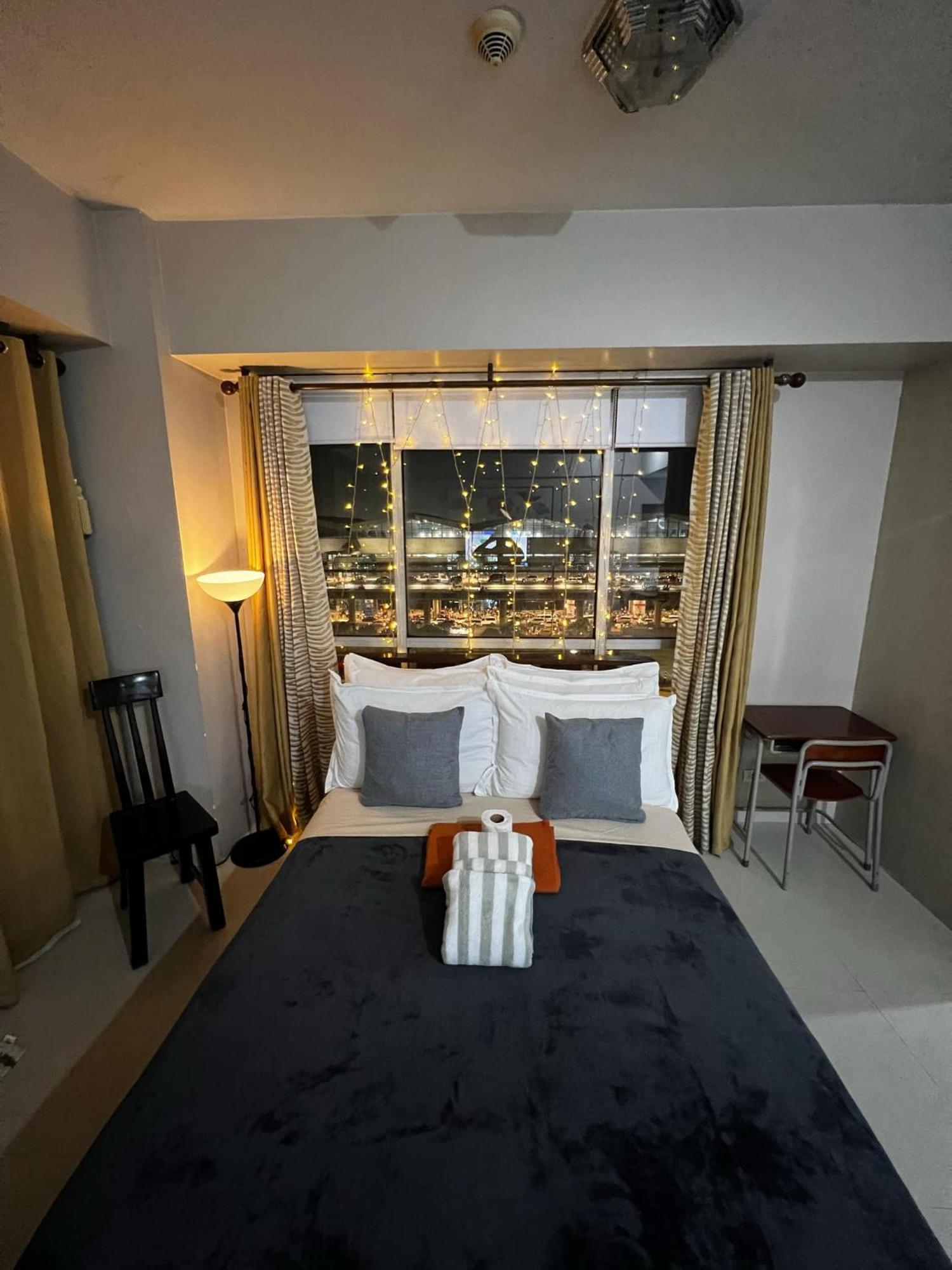 One Palm Tree Villas Condominium - Studio 7Th Fl With Balcony - Across Terminal 3 Airport Пасай Екстериор снимка